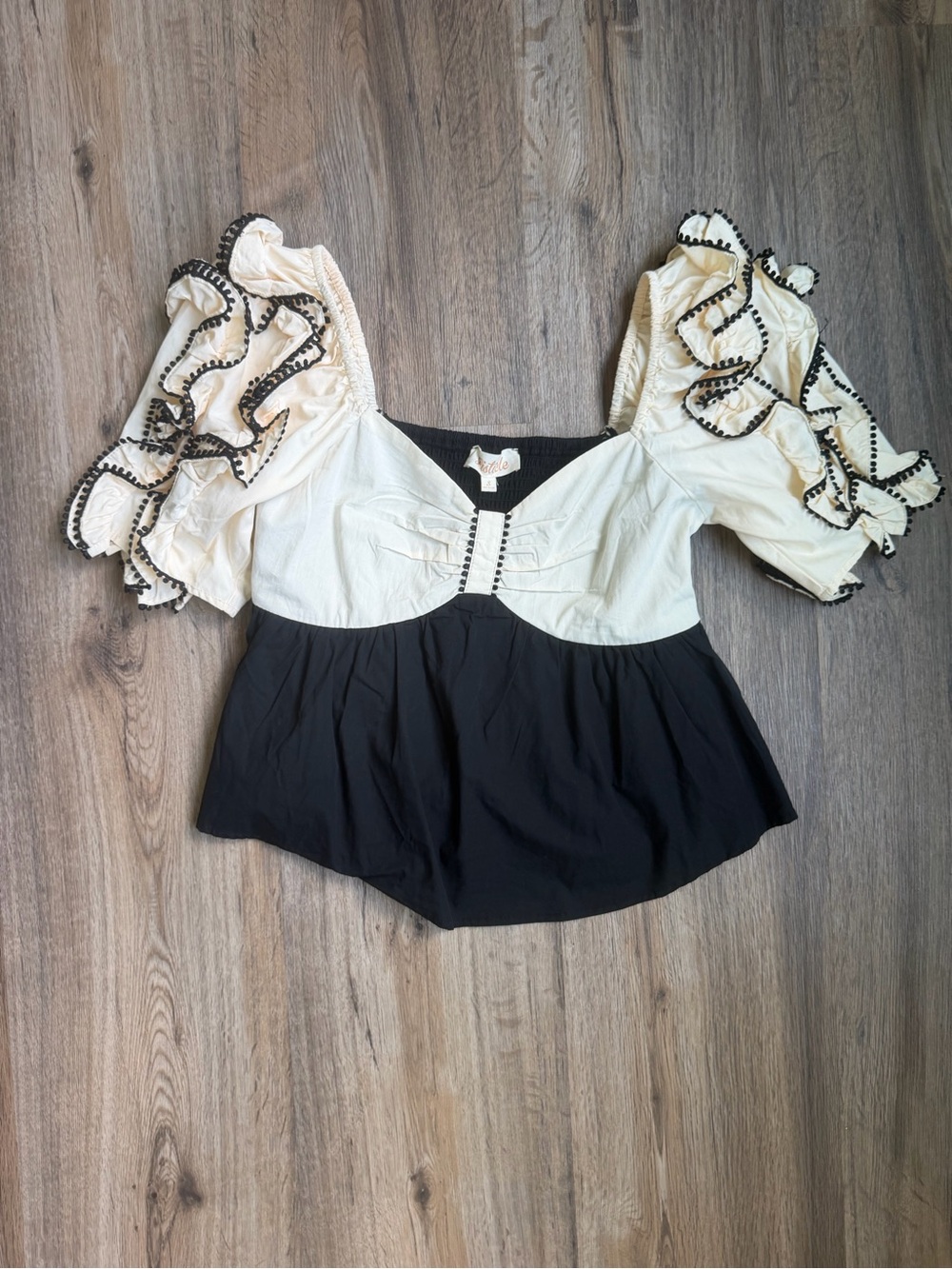 Listicle Ivory and Black Ruffle-Sleeve Peplum Top